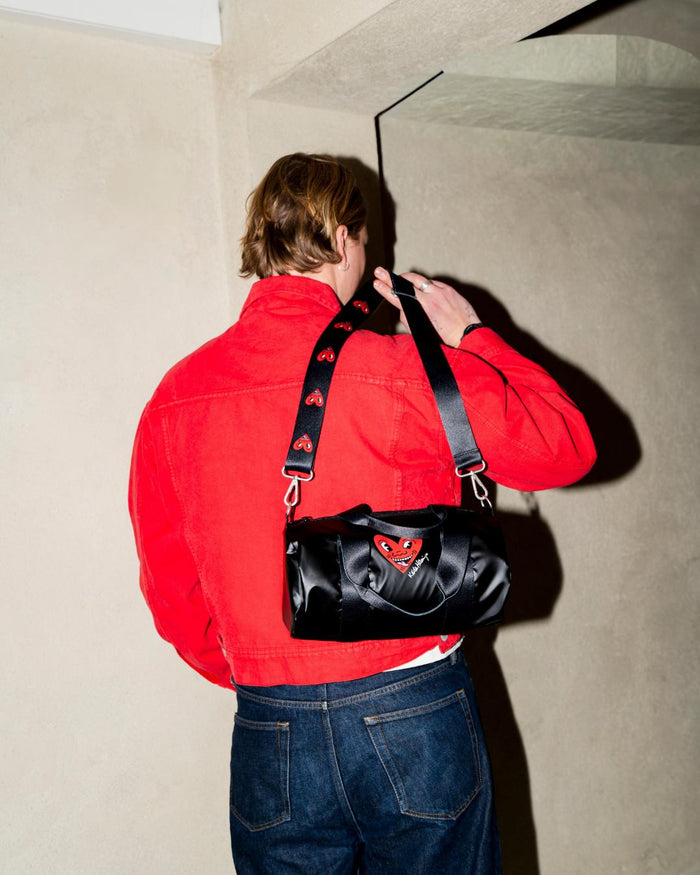 Black Metallic Heart Face Medium Weekender by Keith Haring | LOQI | Weekender Bag