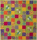 Fabric Cafe - Pattern  Snuggly Bug -  quilt finishes at 46 1/2 By 52