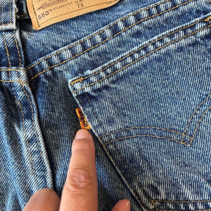 Vintage Levi's 550 Relaxed Fit Slim Orange Tab Jeans 7